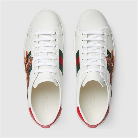 gucci tiger shoes mens|Gucci tiger sneakers high.